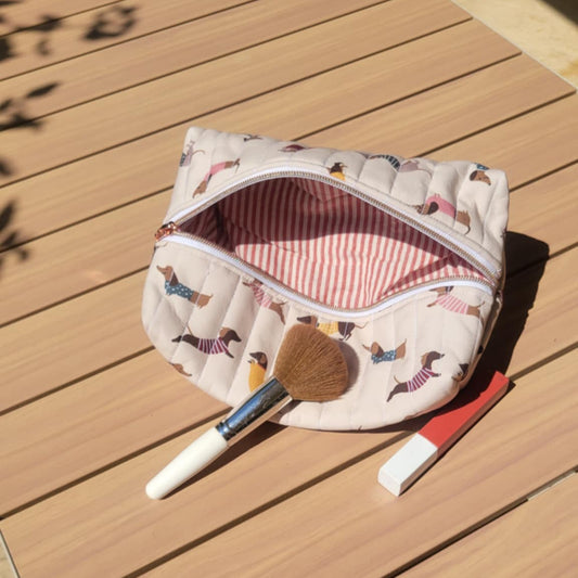 Waterproof dachshund cosmetic bag with red striped lining
