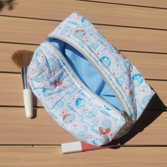 Cosmetic bag with cartoon design on a wooden surface